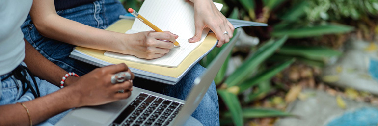 Two students completing the MCAT so they can get into medical school.