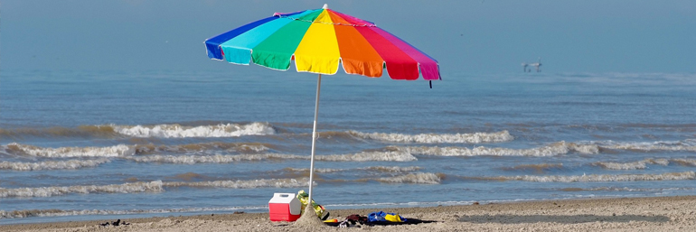 Beach and beach umbrella