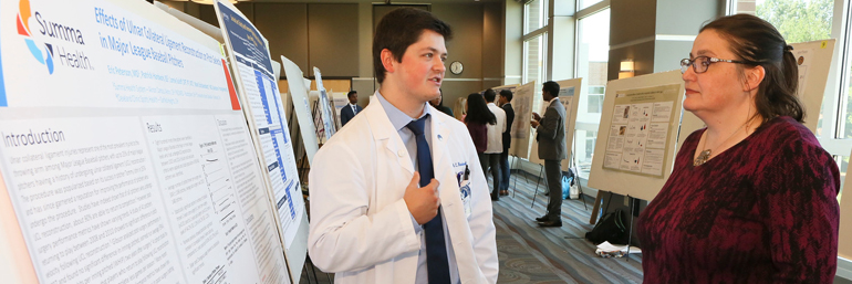 Patrick Handword presenting at poster day