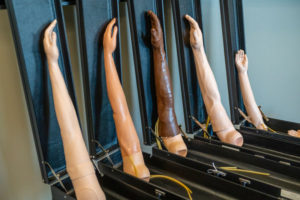 A row of IV practice arms used for training at Wasson Center for Clinical Skills Training, Assessment, and Scholarship.