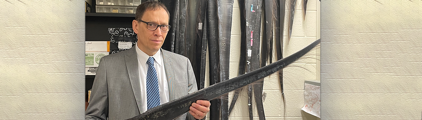 Dr. Thewissen holds a whale fluke